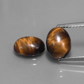 天然棕色Tiger's Eye，椭圆形切割，8.8×6.9毫米，不透明