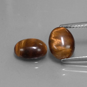 天然棕色Tiger's Eye，椭圆形切割，9×7毫米，不透明