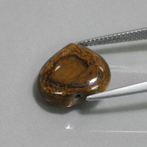 8.46克拉天然棕色Tiger's Eye，心形，14.2×13.4毫米，不透明