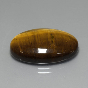 19.40克拉天然棕色Tiger's Eye，椭圆形切割，24.7×16.6毫米，不透明