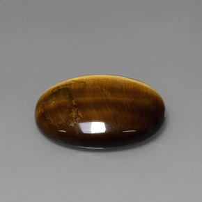 22.74克拉天然棕色Tiger's Eye，椭圆形切割，25.3×20.2毫米，不透明