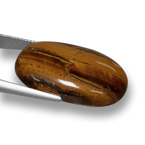 33.59克拉天然棕色Tiger's Eye，椭圆形切割，28.1×19.6毫米，不透明
