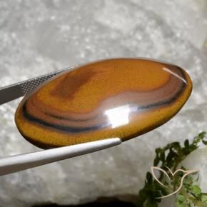 92.65克拉天然棕色Tiger's Eye，椭圆形切割，40.8×29.4毫米，不透明