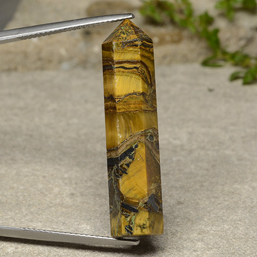 23.84克拉天然棕色Tiger's Eye，异形，36.1×8.7毫米，不透明