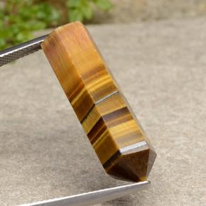 18.73克拉天然棕色Tiger's Eye，异形，28.8×9.2毫米，不透明