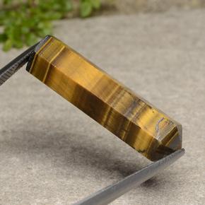 24.72克拉天然棕色Tiger's Eye，异形，33.1×9.5毫米，不透明