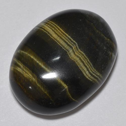 19.06克拉天然多色Tiger's Eye，椭圆形切割，19.4×14.6毫米，不透明