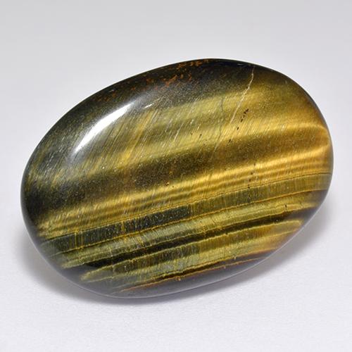 23.65克拉天然棕色Tiger's Eye，椭圆形切割，27.6×19毫米，不透明