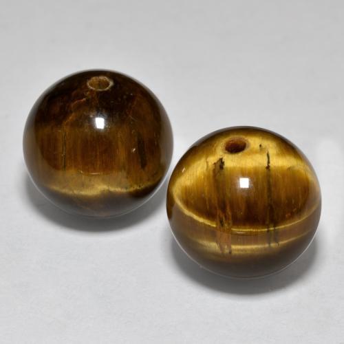 24.83天然棕色虎眼石，球形，12.25毫米，不透明