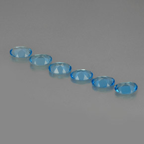 天然托帕石，椭圆形切割，6.9×4.9毫米，VVS-VS